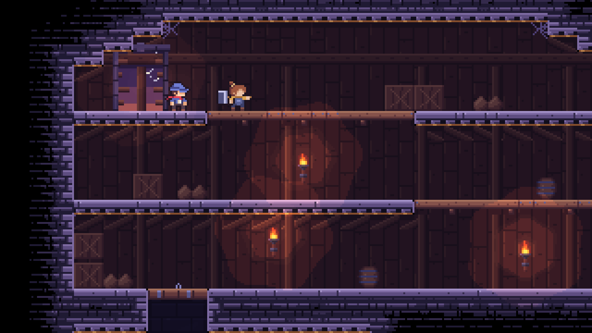 Ladderman and Hammer Girl slip into a dark tower of wooden floors, crates and wall torches.